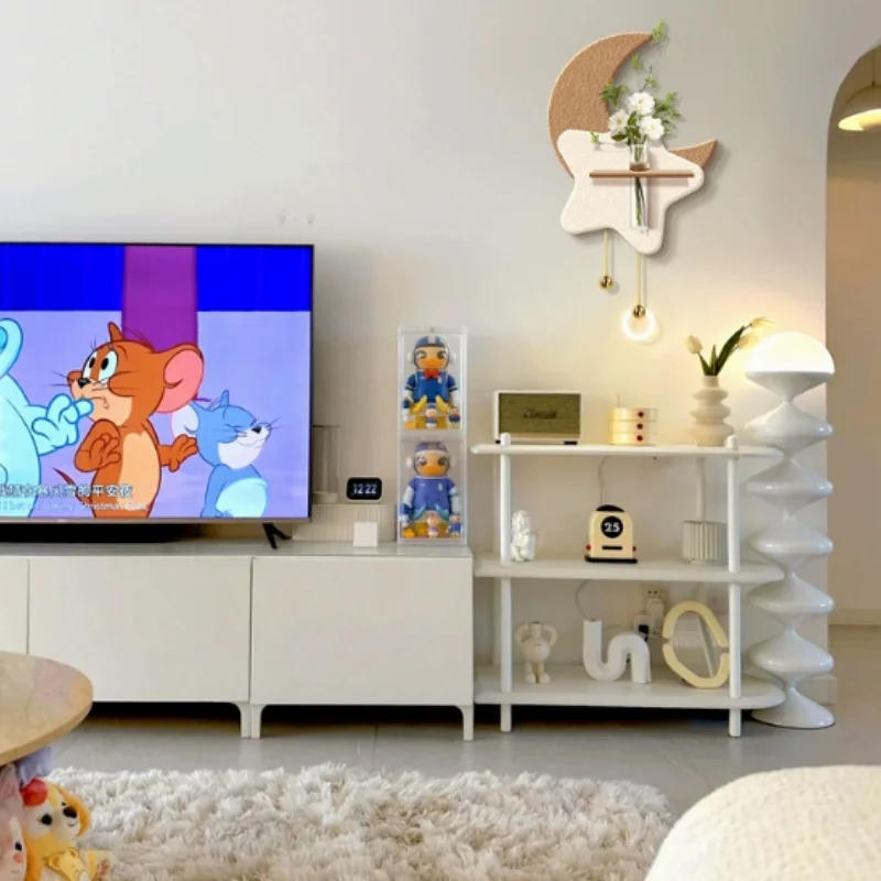 Cream-style living room TV feature wall decor, hydroponic green plants, entryway high-end moon wall scones