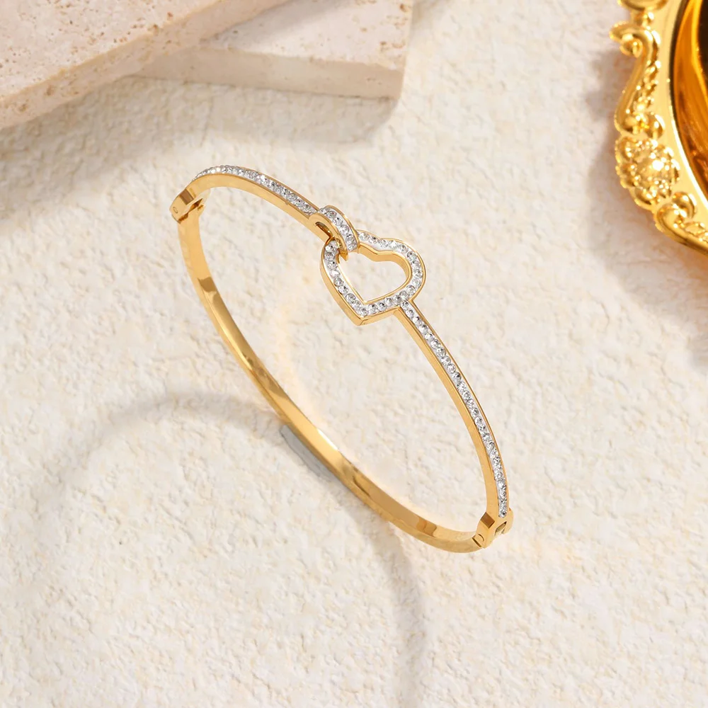 Brazalete de corazón ahuecado de lujo para mujer, pulsera chapada en oro con incrustaciones de circonita de acero inoxidable, joyería de moda, regalo del Día de San Valentín