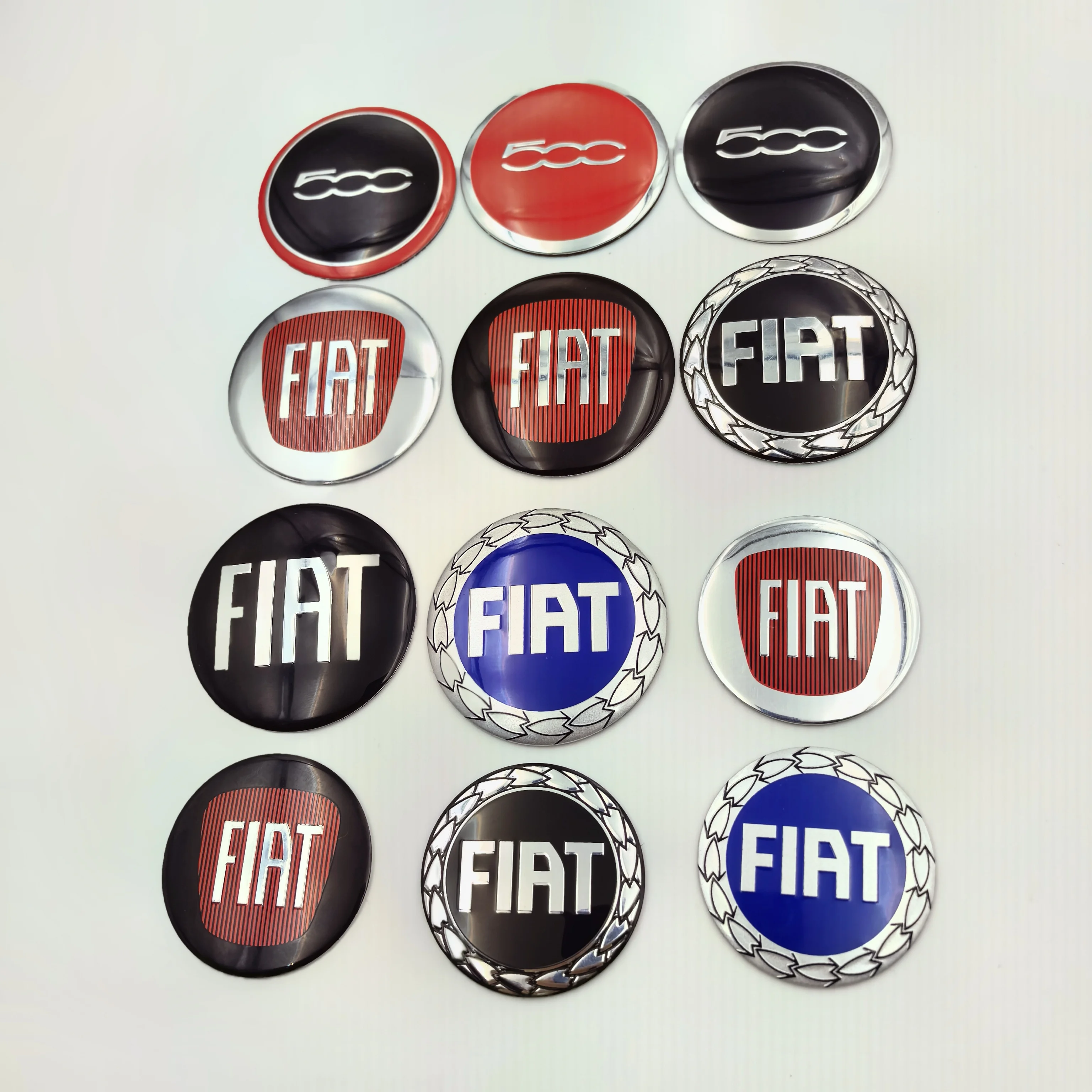 1-шт-50-мм-56-мм-логотип-fiat-эмблема-автомобиля-центральная-ступица-колеса-авто-обод-ремонт-пыленепроницаемые-крышки-значков-наклейка-аксессуары-для-стайлинга-для-500