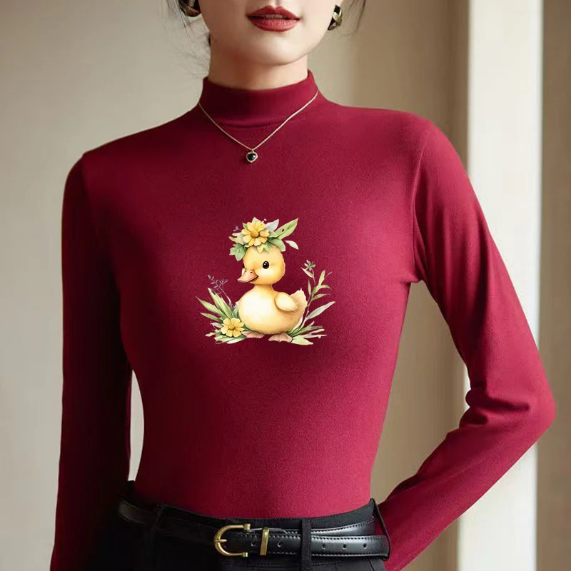 Camiseta térmica de manga larga para mujer, con cuello alto y forro polar, ideal para el invierno, con estampado de patitos amarillos y flores, cálida y cómoda.