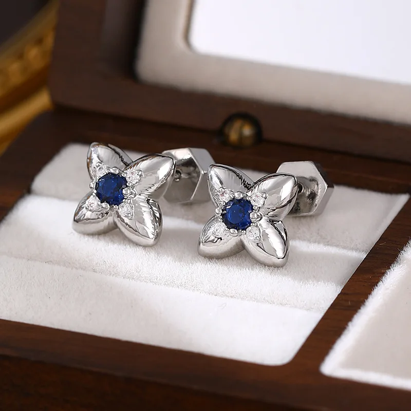 

Lucky Clover Earrings - 18K Gold Plated Blue Zircon Flower Studs Dainty Minimalist Boho Jewelry for Women Vacation Style