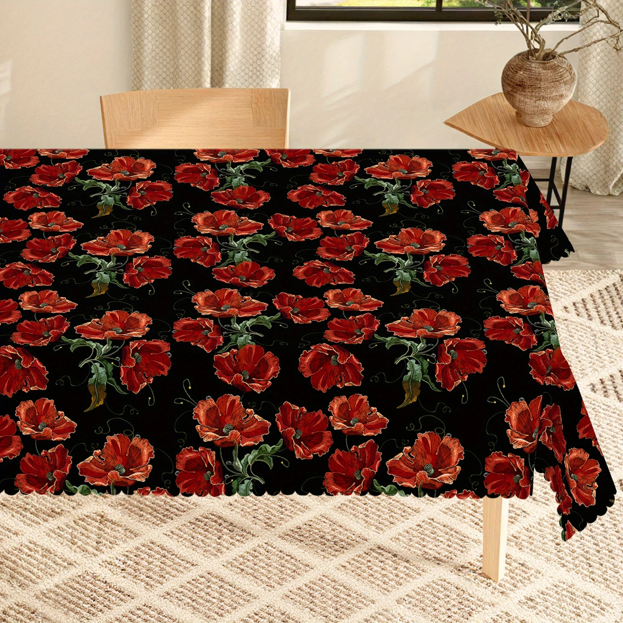A beautiful and vintage floral tablecloth with a red poppy pattern