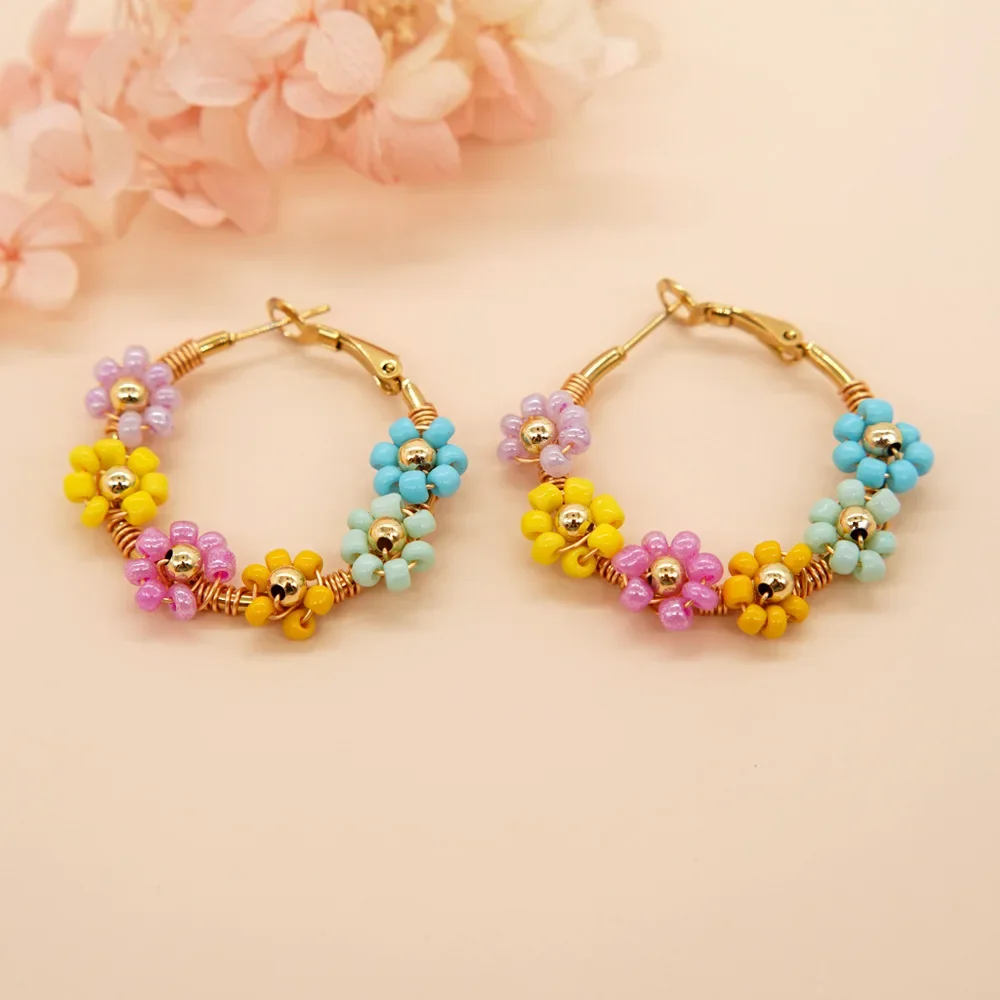 Beaded earrings Flower shape Circle Originality Hand knitting Bohemia Alloy Tide Simple Graph Rice bead earrings