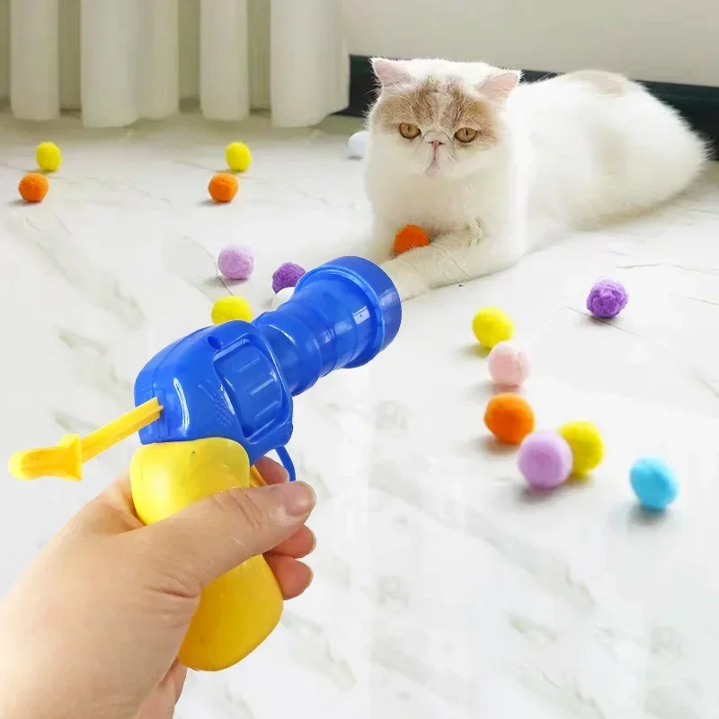 Giocattoli per gatti Giocattolo interattivo per addestramento al lancio per gattini domestici Mini giochi creativi con pistola da tiro Giocattoli con palline di peluche elasticizzate Forniture per animali domestici