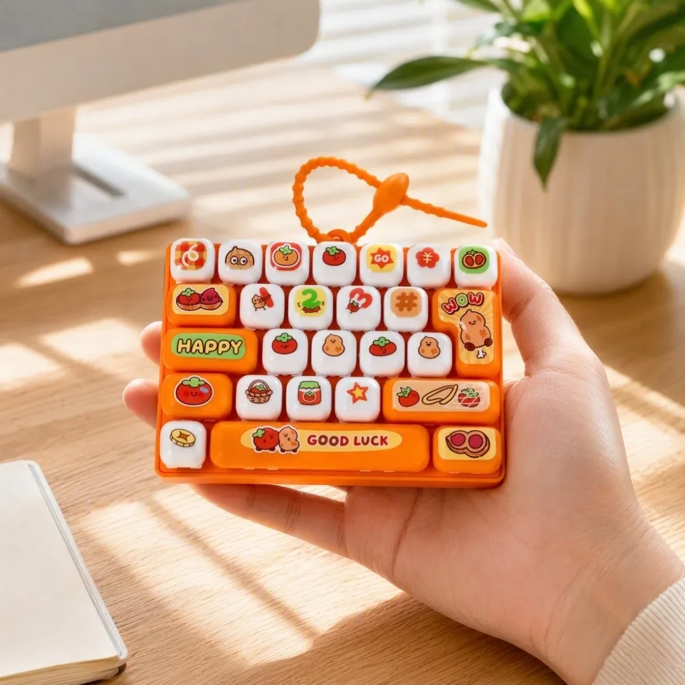 Drückbare Tasten, 26 Tasten, Tastatur-Schlüsselanhänger, zur Stressbewältigung, klare Tastenklänge, mechanische Tastatur, Cartoon-Frucht-Design, Plastik-Fidget – Detail 7