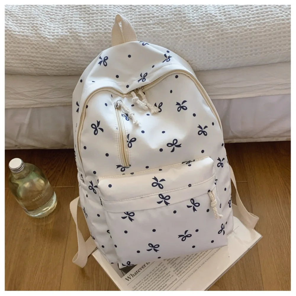 حقيبة ظهر لطيفة متعددة الجيوب مطبوعة على شكل فيونكة ذات سعة كبيرة من النايلون حقائب مدرسية بأشرطة قابلة للتعديل حقيبة كتب للاستخدام اليومي