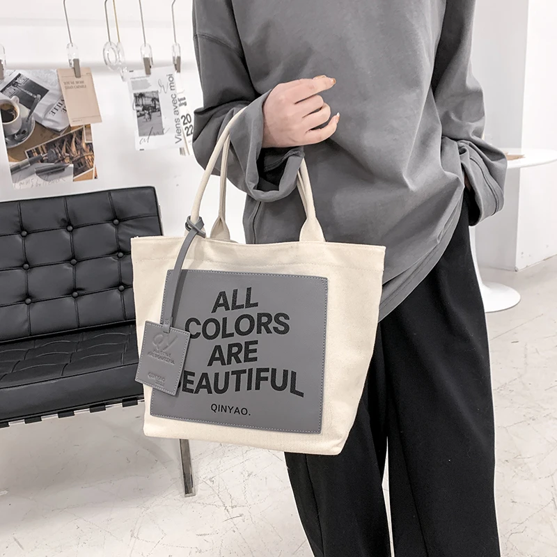 Bolso de lona con el alfabeto para mujer, bandolera de mano de gran capacidad, informal, versátil, a la moda coreana, novedad de 2023