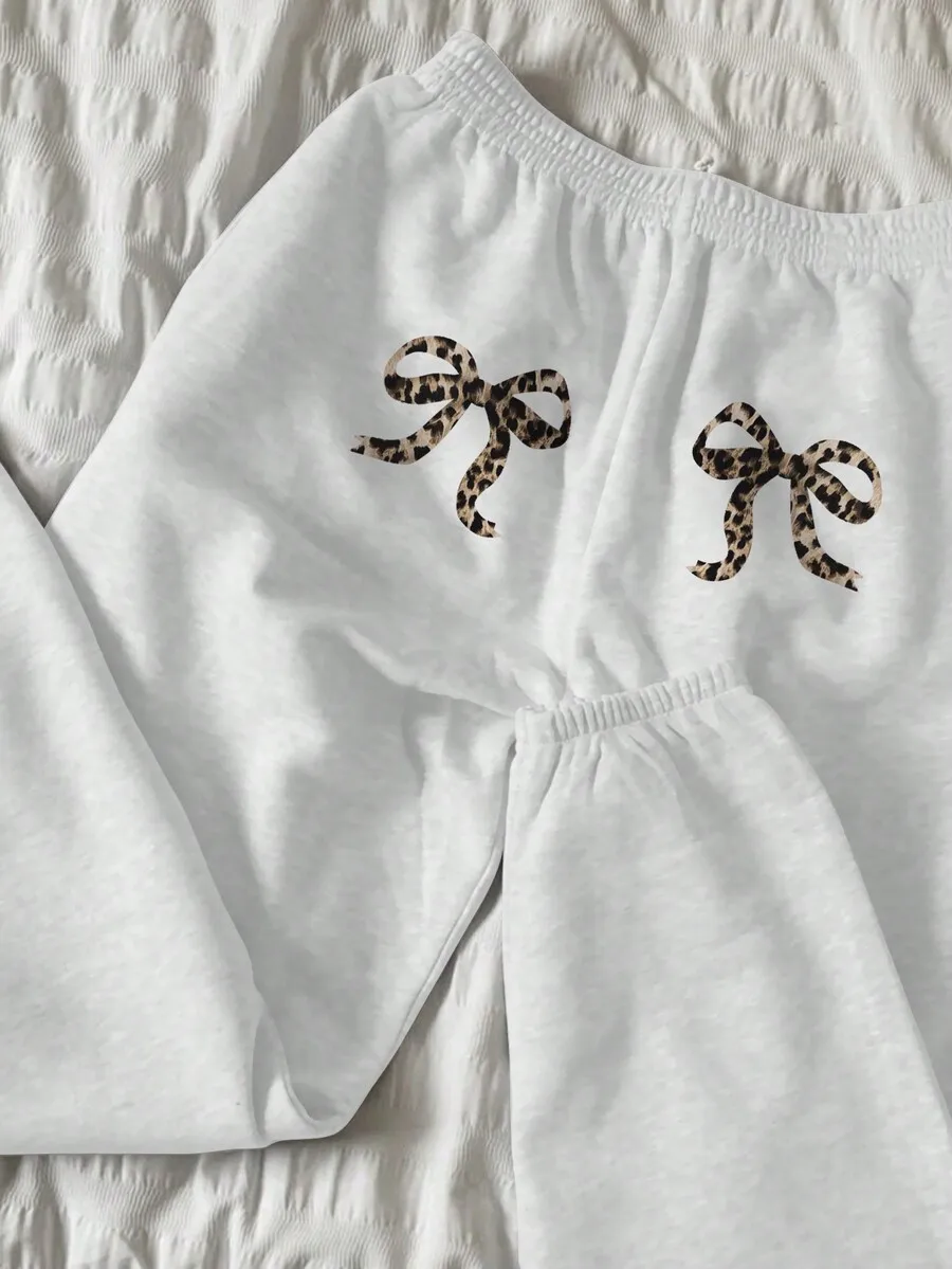 

Женские белые повседневные брюки с леопардовым принтом и бантом, на эластичной резинке