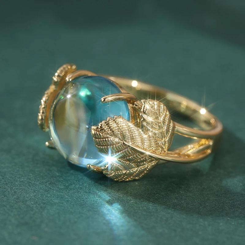 Vintage-Ring für Damen in Goldfarbe mit eingelegtem meerblauen Stein, Blatt- und geometrischer Schnitzerei, für den täglichen Gebrauch, Partyschmuck – Detail 3