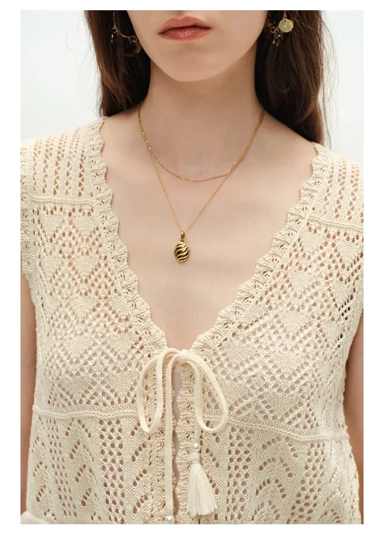 Estilo boêmio damasco escavado colete de malha de design de verão feminino de duas peças emparelhado com conjunto de meia saia fina