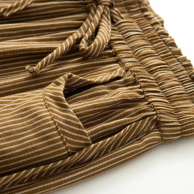 Pantaloni da donna con stampa a righe alla moda Design con tasca laterale Pantaloni larghi a gamba lunga dritta 2025 Autunno/Inverno Street Style da donna