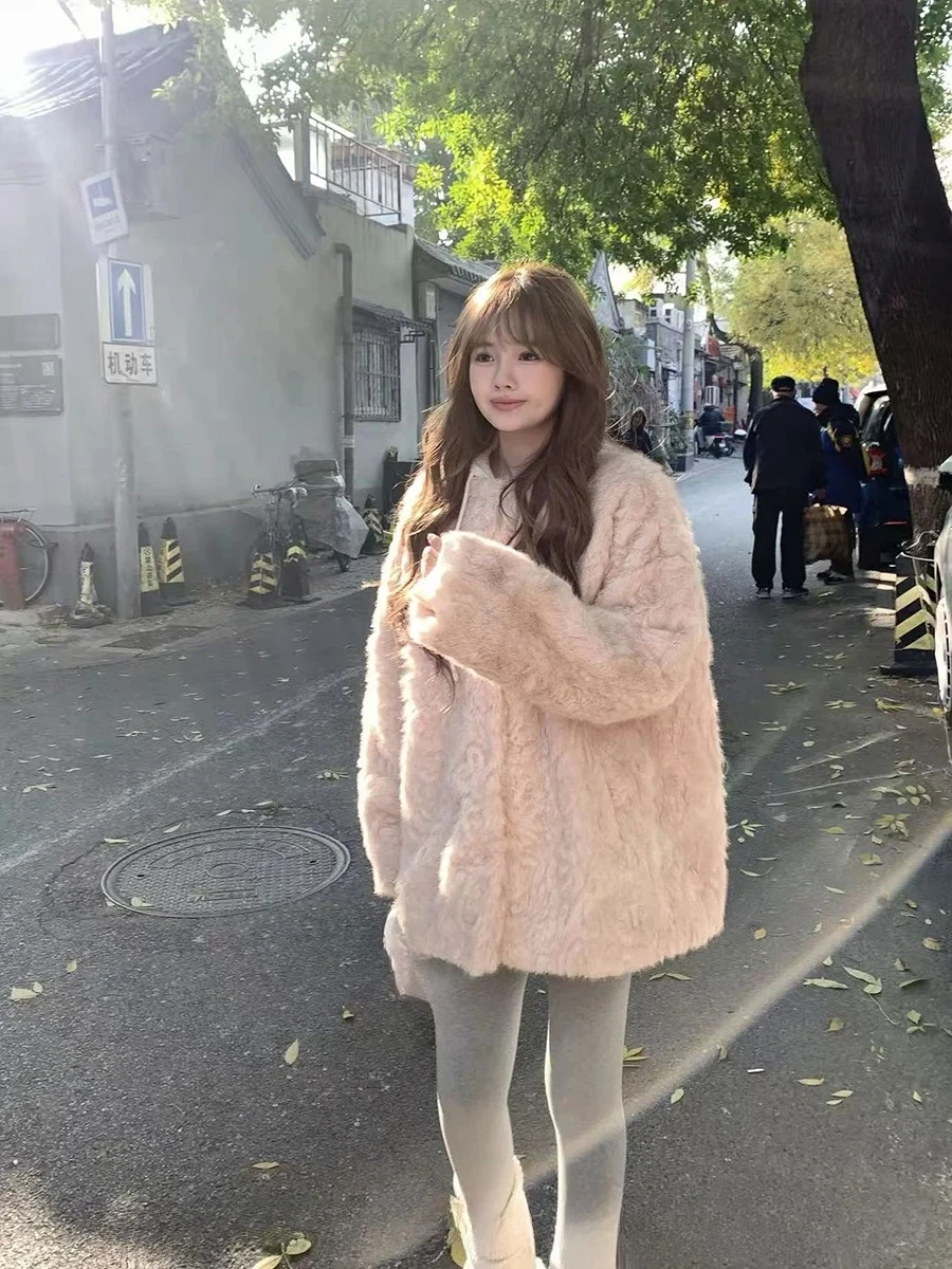 Style d'hiver épaissi chaud simple boutonnage nouvelle laine d'agneau fourrure intégrée femmes manteau veste couleur unie mi-longue ample décontracté