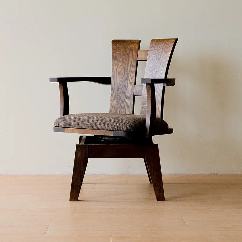 Solid wood swivel chair made of old and reworked dark red oak dining chair