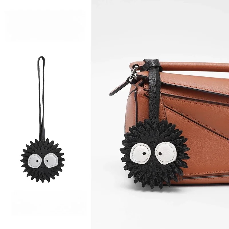 

Coal Spirit Keychain for High-End Cars, Unique Bag Hanging, Light Luxury Style with Woolen Bean Paste Pink Color