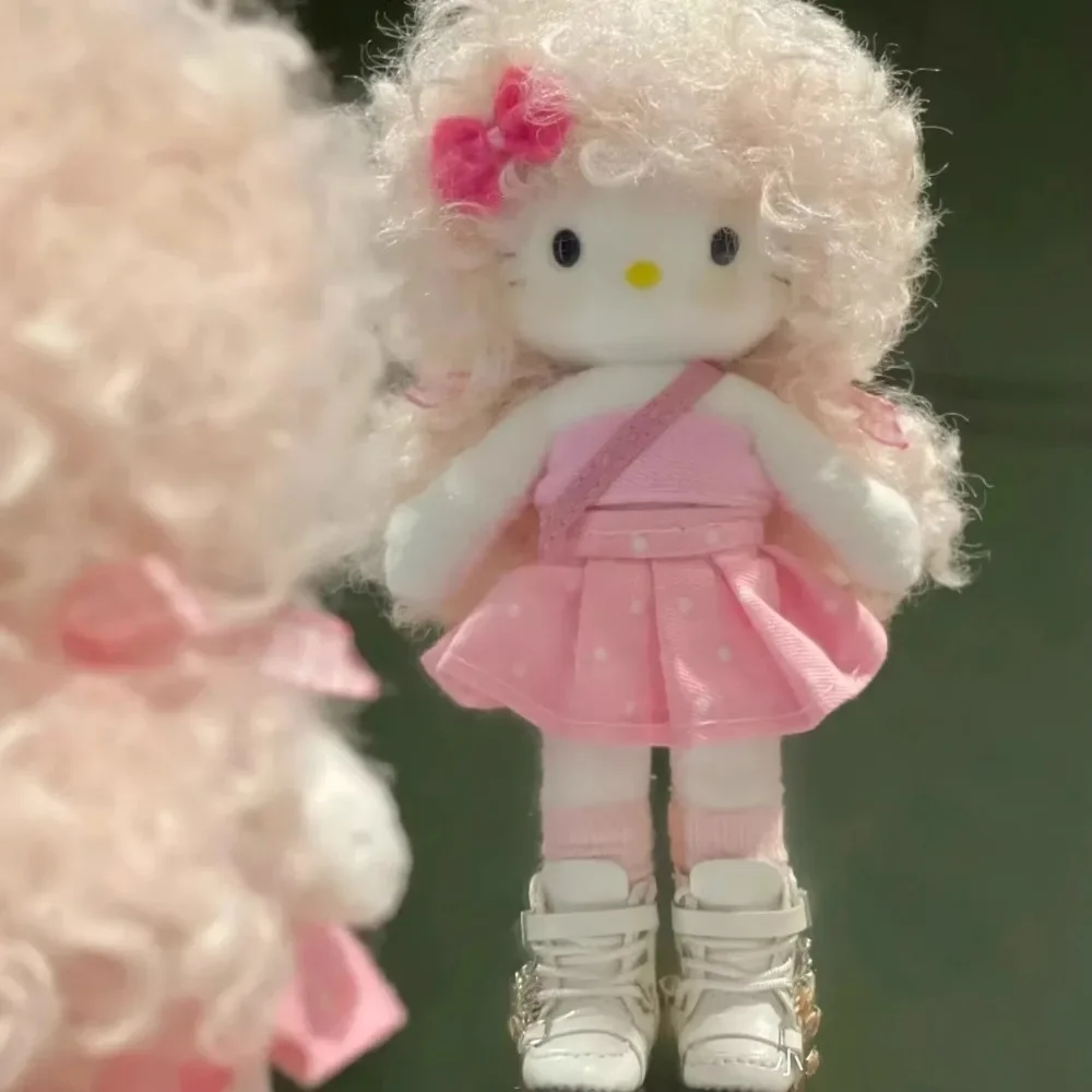 Echte Hello Kitty Eluches Miniso süße coole explosive Kopf lange Bein Rucksack Anhänger Mädchen süße lockige Haare Mädchen Plüschtier