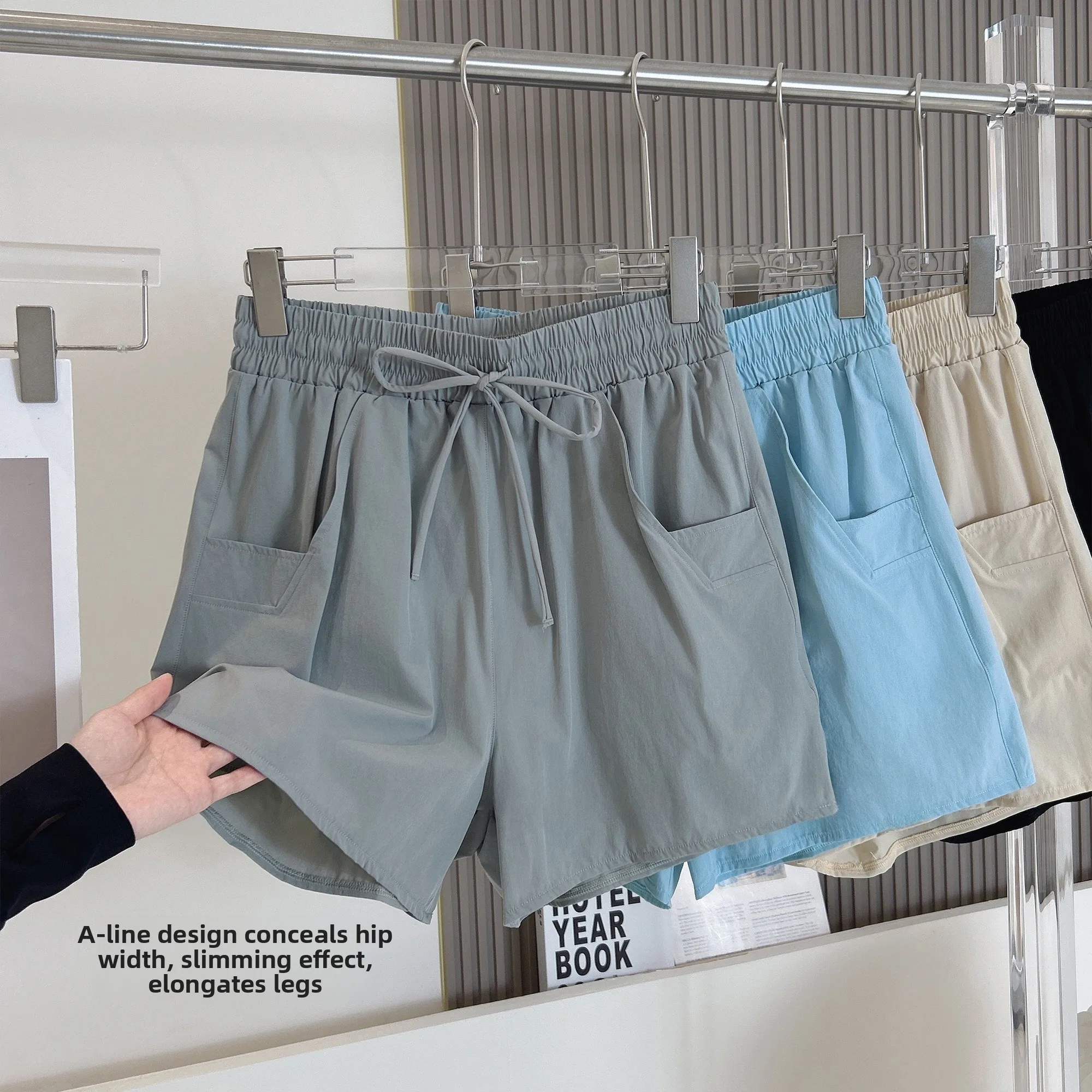 

Новые летние спортивные шорты для йоги с высокой талией, быстросохнущие, свободные, из нейлонового волокна, для женщин