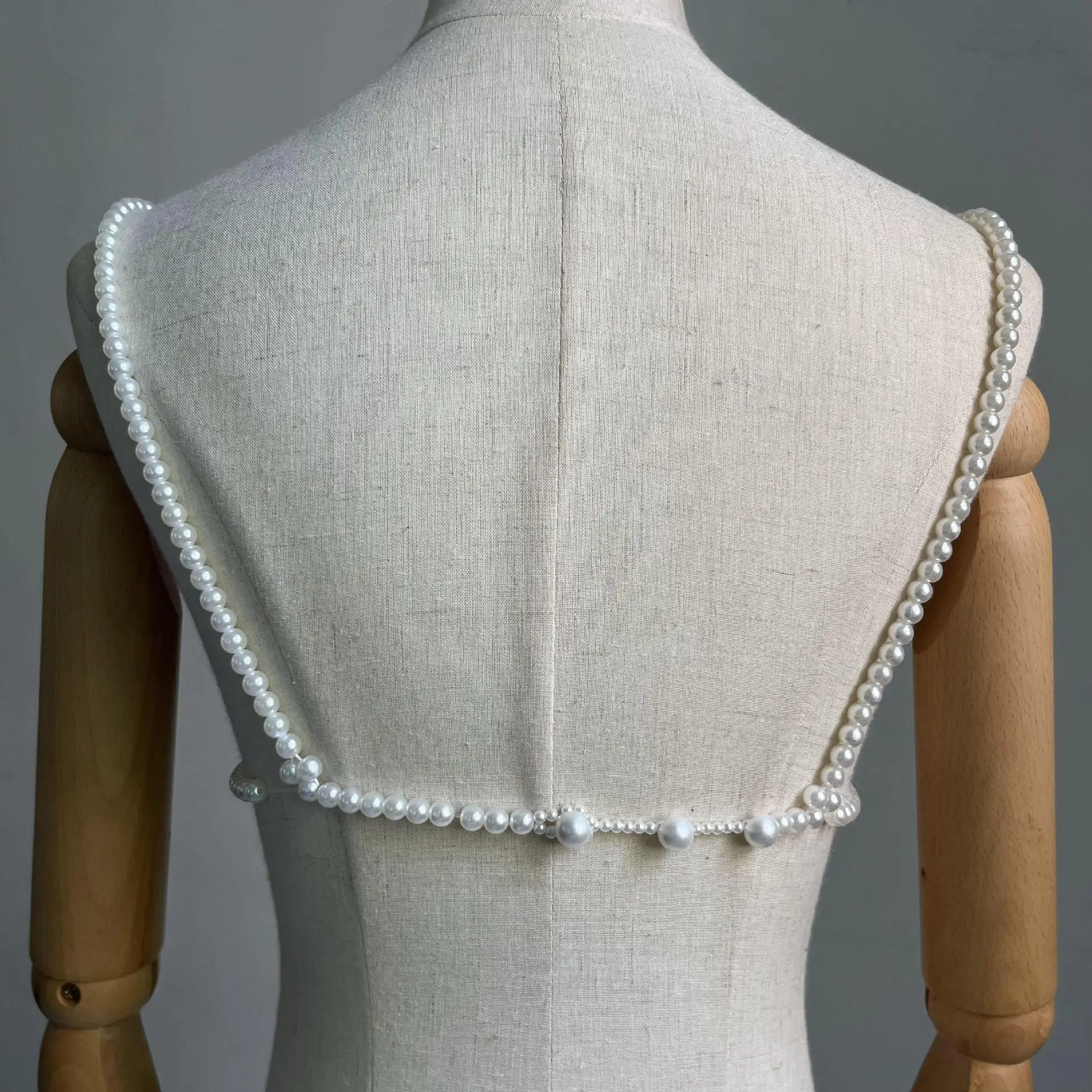 女性のための手作りの模造真珠のビキニ,真珠のボディチェーン,セクシーなアイボリーのホルタートップ,ファッション