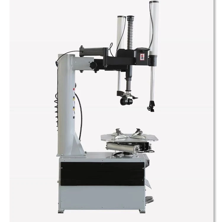 Машина для разборки и сборки автомобиля. Машина для снятия шин с двойным вспомогательным рычагом влево и вправо.