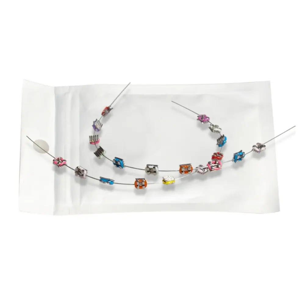 

1 Pair Colorful Temporary Tooth Decoration Dental Decorations with Metal Wires Orthodontic Ligature Ties Braces Fake Brackets