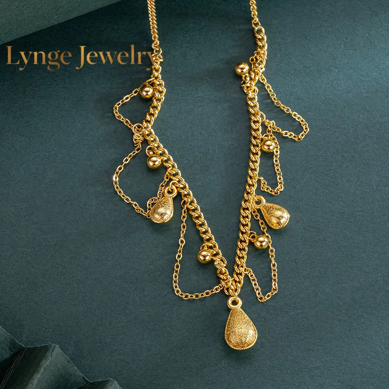 

Lynge Jewelry 9999 24K real gold water drop lace chain gold necklace for women tassel hollow chain design pendant 5G brushed cra