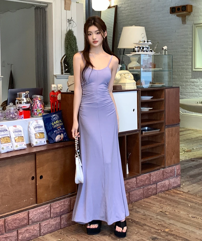 2023 spring and summer new cool sense of fold suspender dress women loose backless long skirt