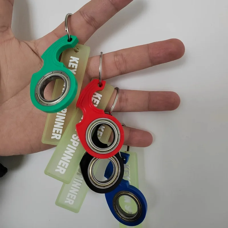 Vendita calda Nuovo Karambit Spinner Dito Girevole Artiglio Coltello Portachiavi Grano di Metallo di Alta Qualità Texture Fidget Spinner Portachiavi In Metallo Giocattolo