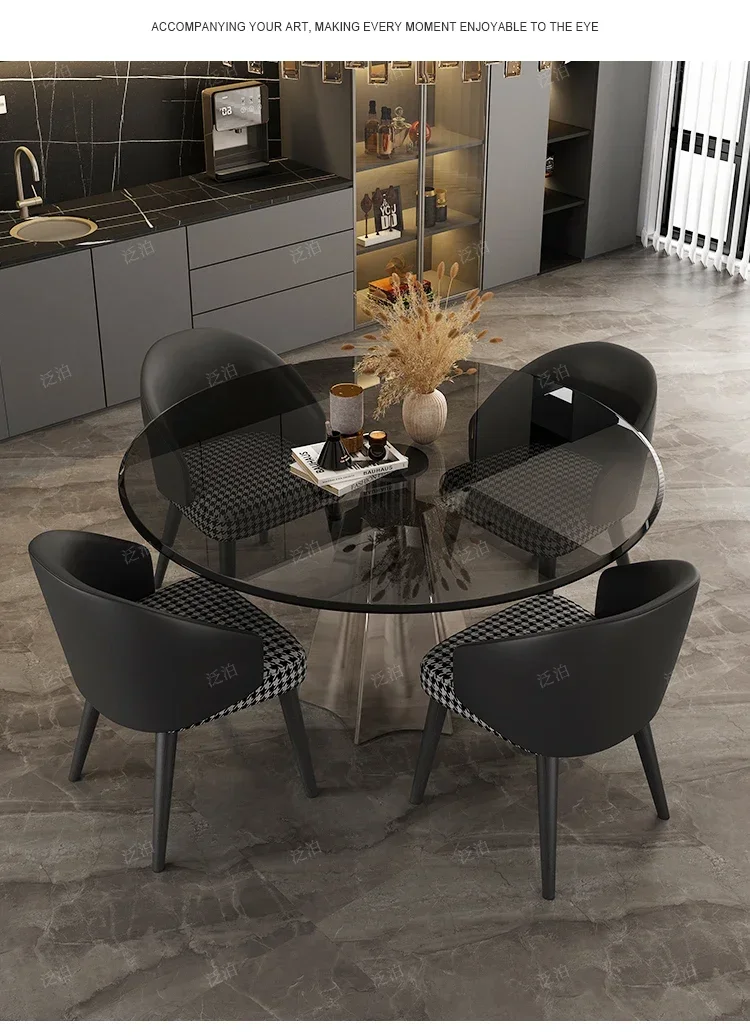 A Tempered glass negotiation table Light luxury household small apartment dining table Modern simple round stainless steel
