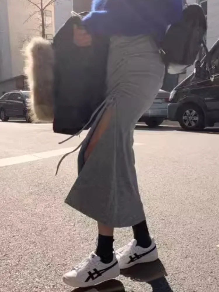 تنورة نصفية مثيرة متوسطة الطول غير متماثلة مع رباط للنساء للخريف والشتاء بخصر عالٍ متعدد الاستخدامات