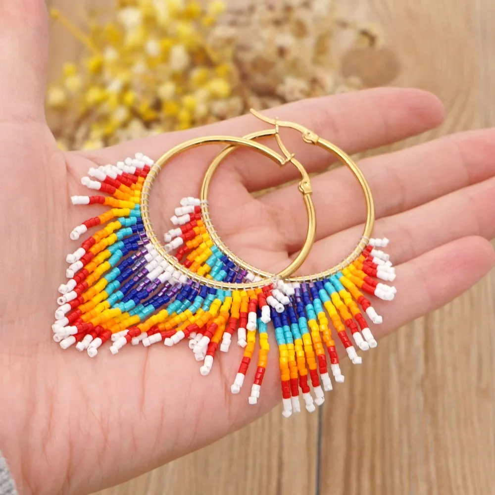 

Rice Bead Earrings Hand knitting fashion circle Beading Simple Bohemia geometry alloy ma'am Fringe Earrings