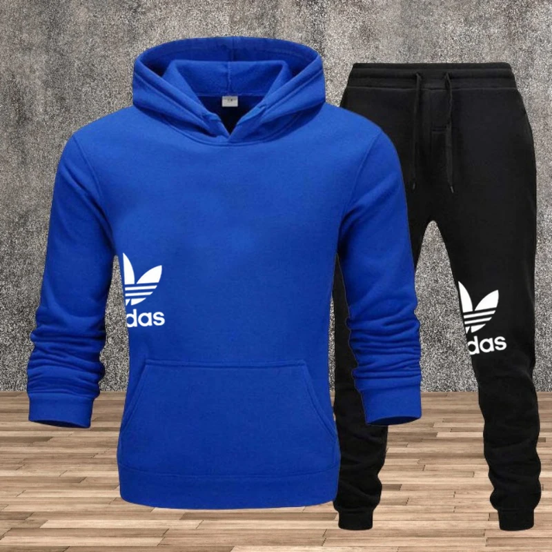 Set di abbigliamento sportivo da jogging alla moda fitness da uomo per l'autunno e l'inverno, dotato di una felpa con cappuccio in due pezzi e pantaloni casual