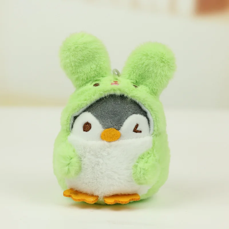 دمية قطيفة على شكل بطريق أو أرنب لطيف، قلادة مفاتيح أو زينة للحقائب