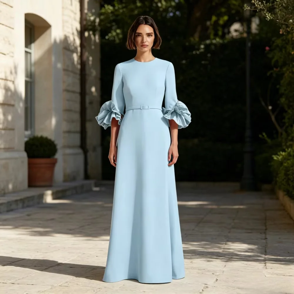Custom round‑neck maxi gown with bubble three‑quarter sleeves. Simple flowy fabric, modest cut, suitable for Middle East parties