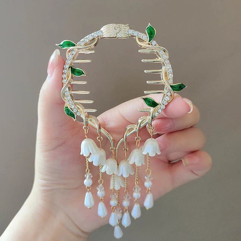 

Lily of the valley tassel hairpin, a must-have for fixing women's bun hair, a high-end hairpin, a semi-tied bun hair accessory