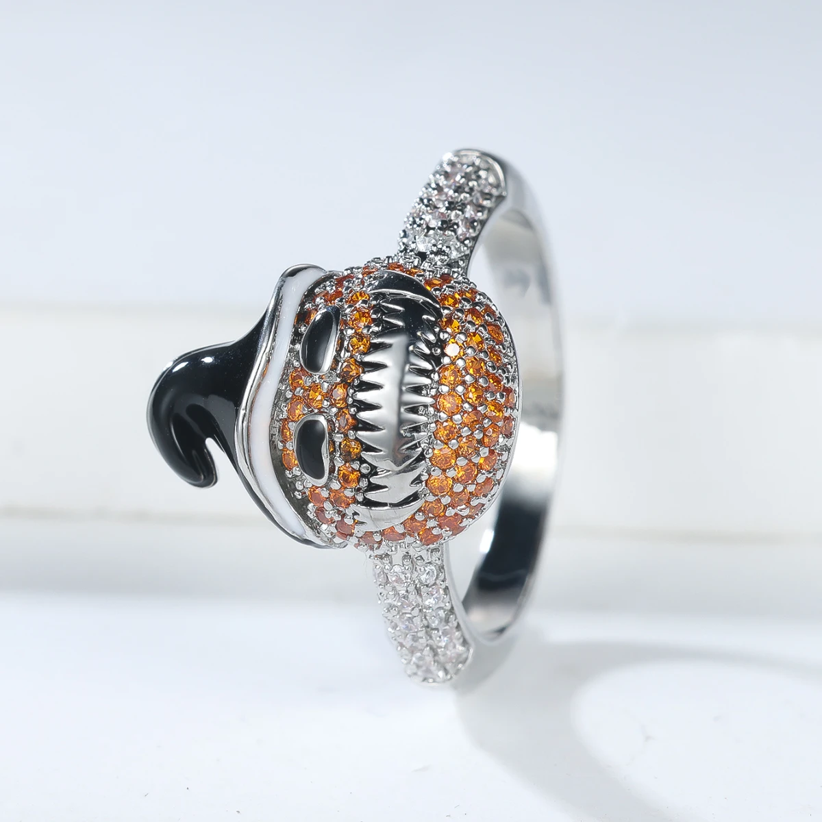 A unique and stylish women's ring featuring an orange and white synthetic zircon pumpkin wizard hat design, a captivating and qu
