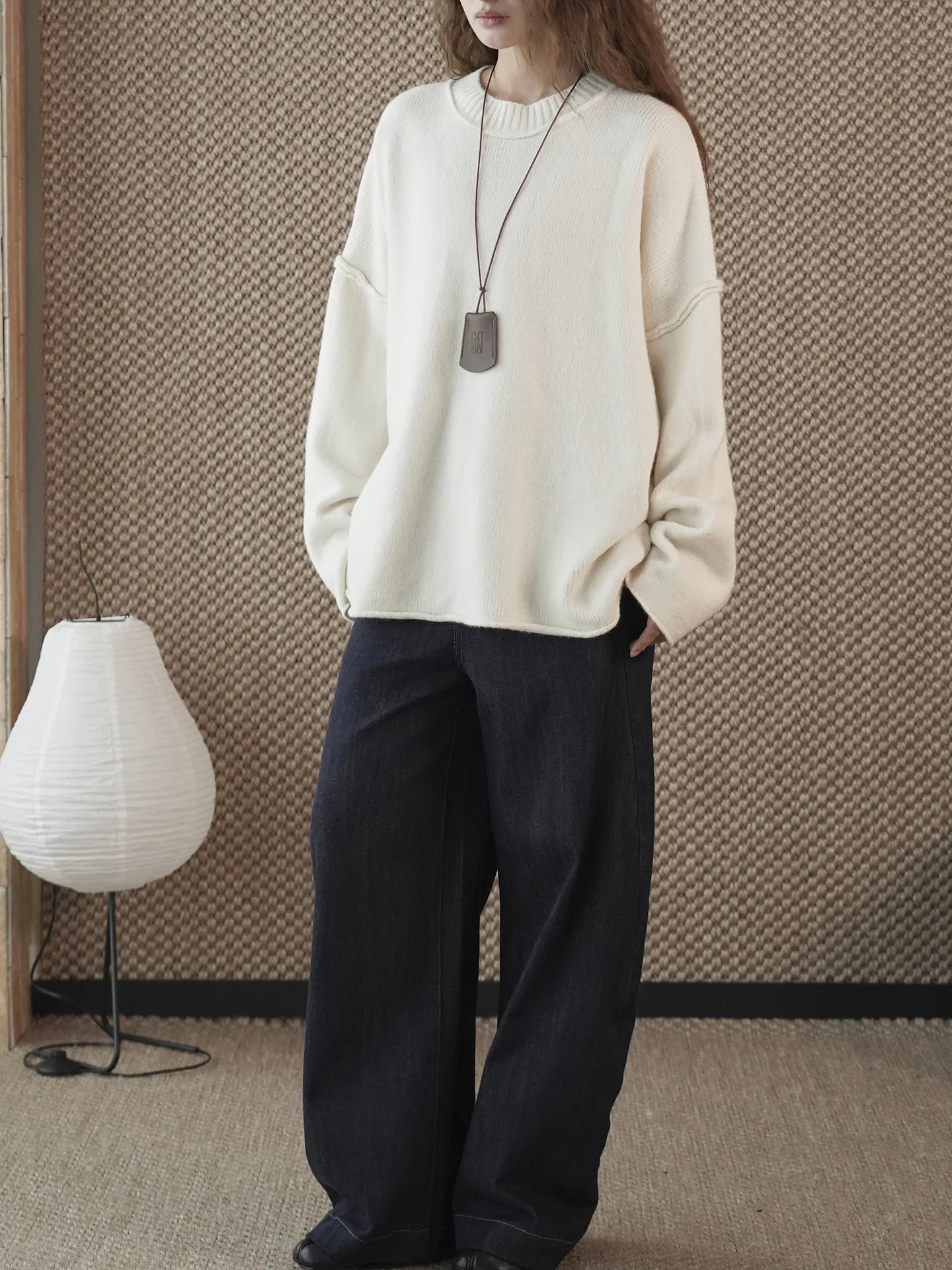 Winter neue koreanische Version einfacher Rundhals-Strickpullover mit leicht Fransen und lockerer und lässiger Silhouette für Frauen