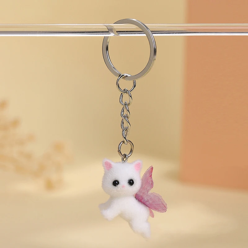 Niedliche beflockte Katze mit rosa Schmetterlingsflügeln, Schlüsselanhänger, 3D-Anhänger, Kopfhörer-Hülle, Charm, Tasche, Dekor, Auto-Schlüsselanhänger, Schmuck, Geschenk