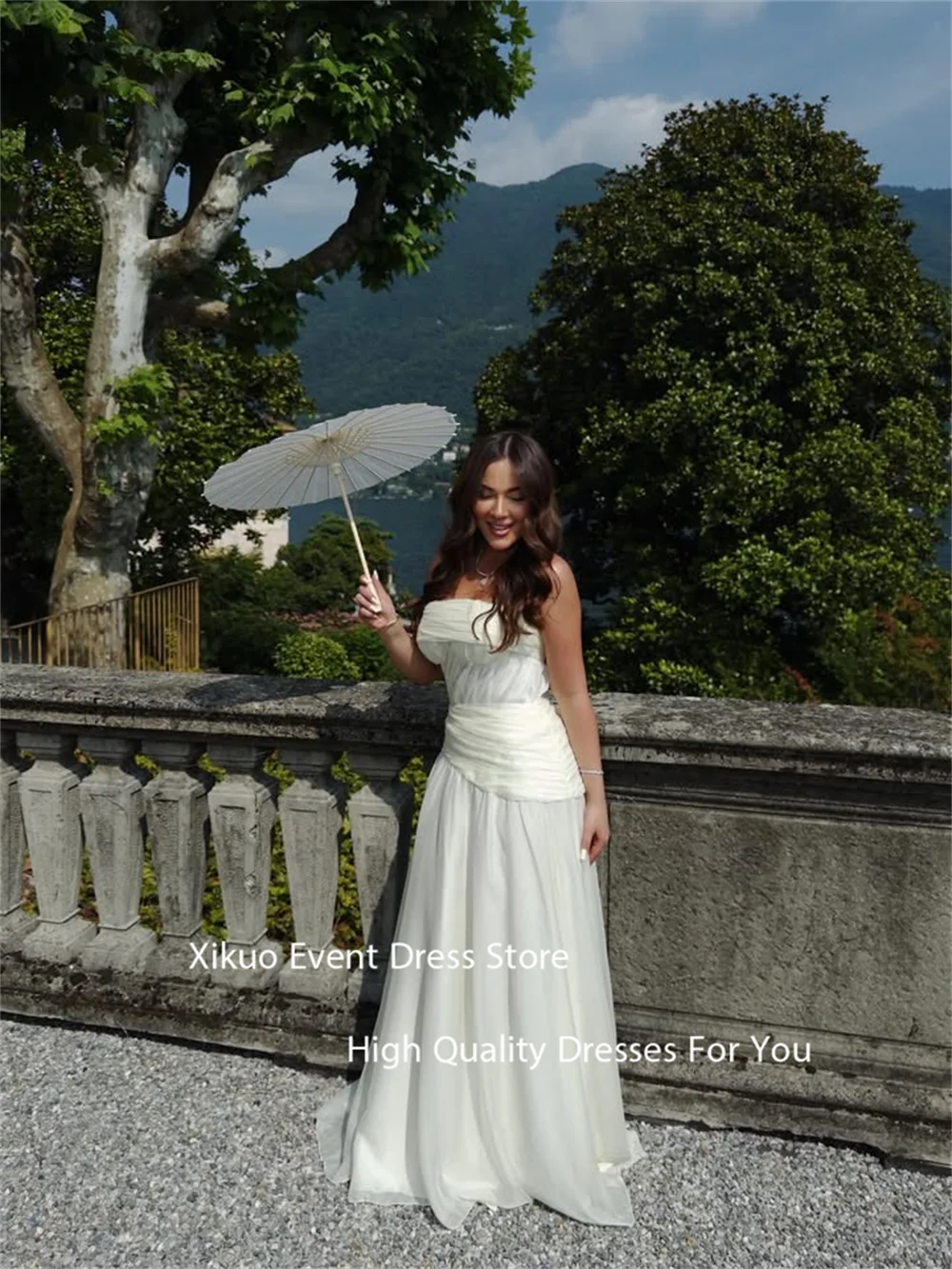 فساتين سهرة طويلة من الشيفون من Xikuo مكشكشة على شكل حرف A أنيقة من فيستدوس دي غالا بدون حمالات مطوي مكشكشة حسب الطلب