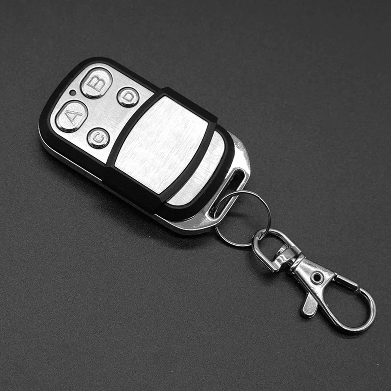 รีโมทคอนโทรล 433.92 เมกะเฮิรตซ์คัดลอกรีโมทคอนโทรลเครื่องทำสำเนาคีย์ความไวแสงสูงสำหรับรถบ้านโรงรถประตูอุปกรณ์เสริม