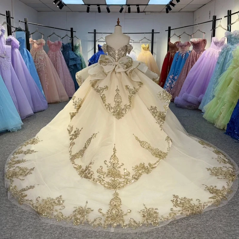 Champagne brillant Quinceanera robes hors de l'épaule or Applique dentelle perles cristal arc tulle fête anniversaire doux 16 robe
