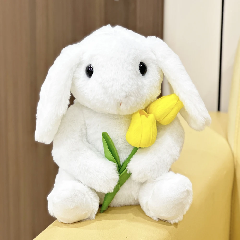 Peluche di coniglio bianco con fiori di tulipano