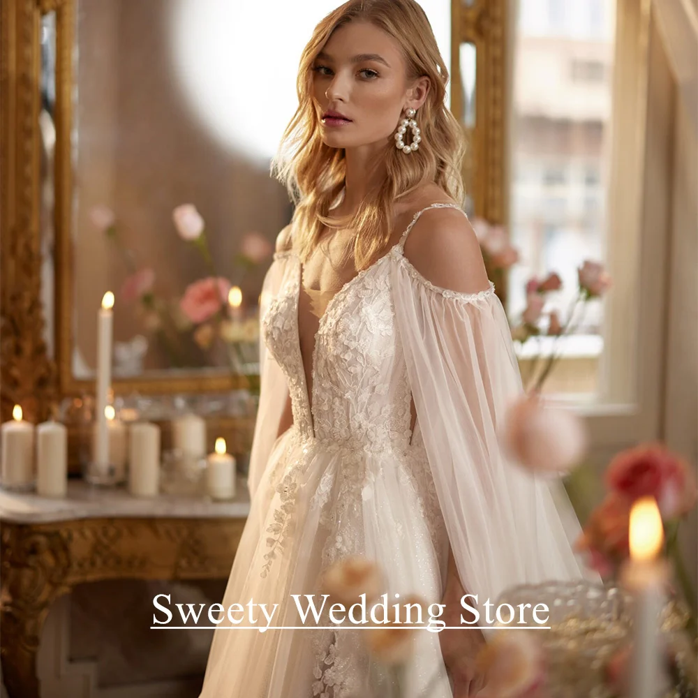 Abito da sposa avorio personalizzato sexy senza spalline scollo a V applicazioni di perline scintillanti tulle abito da sposa linea A con mantello
