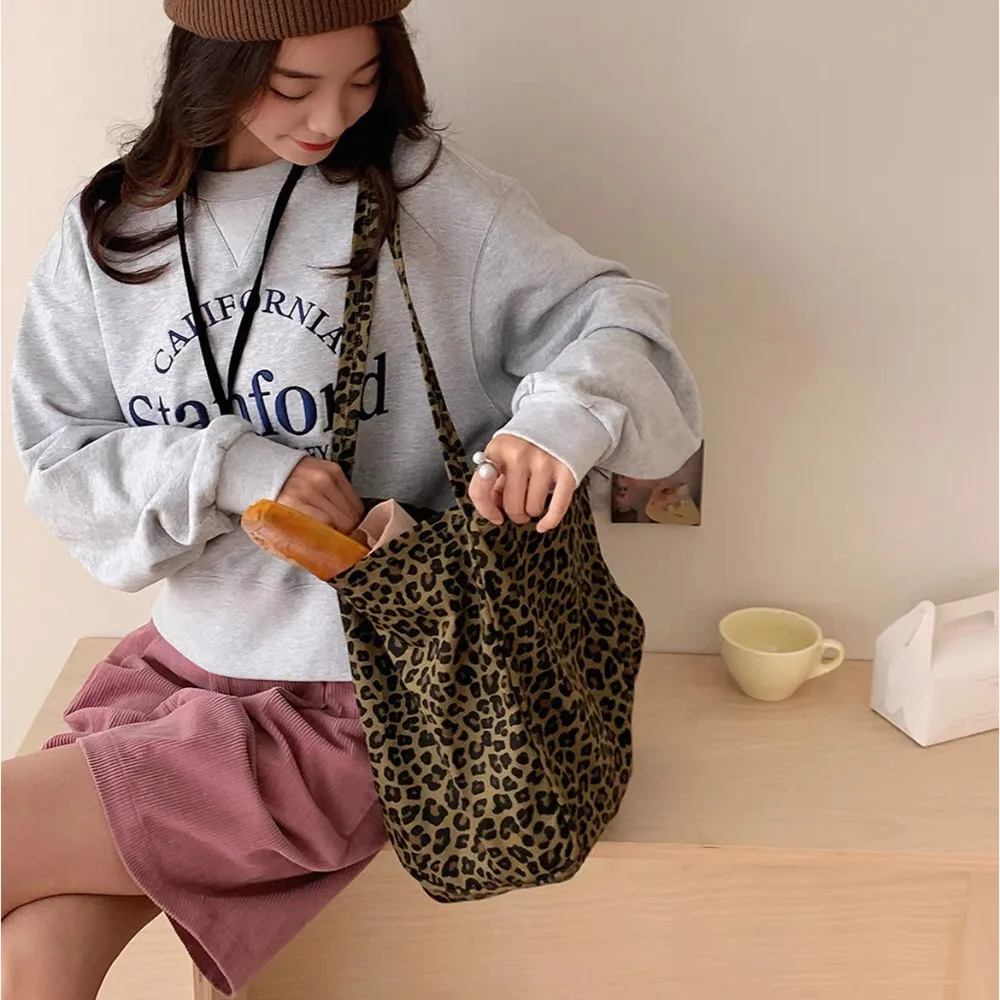 

2025 popular large-capacity leopard print tote bag, canvas bag, shoulder bag, portable shopping bag, messenger bag for women