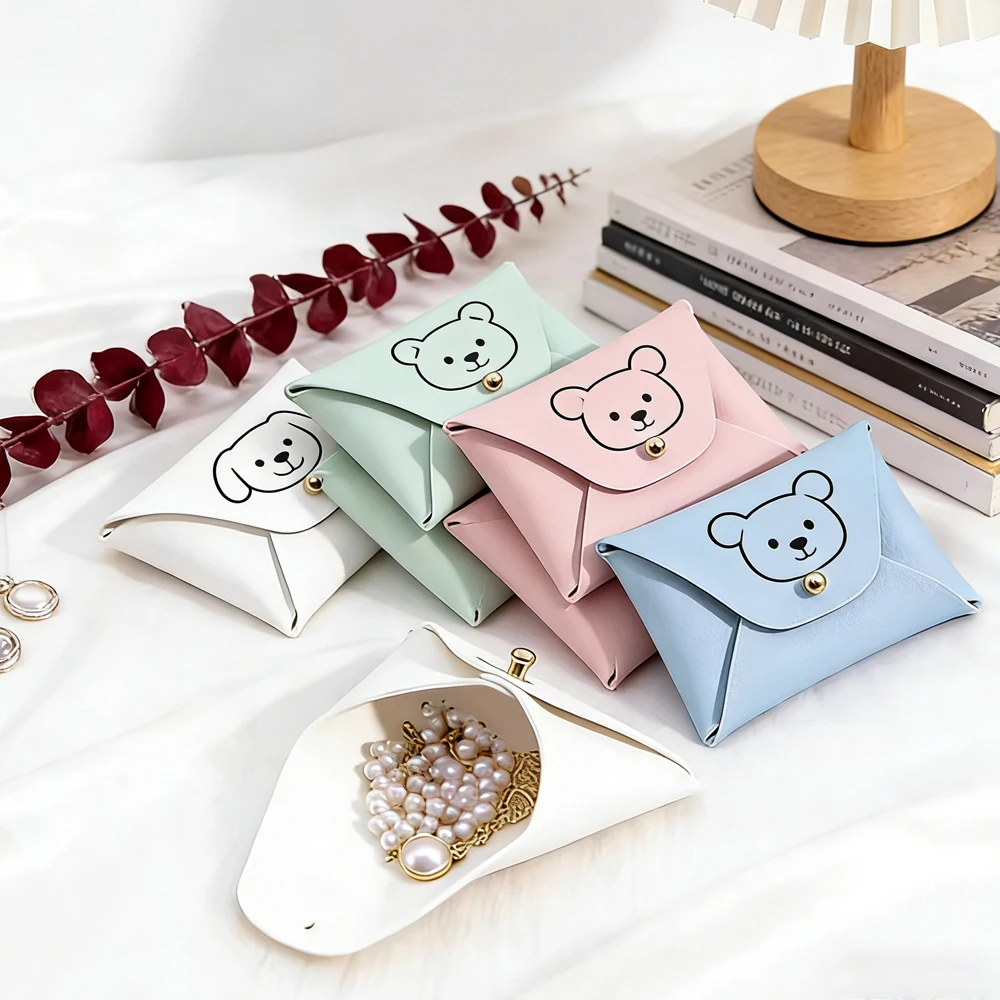 

50/100Pcs Custom Logo 7x5cm PU Jewelry Storage Bag Leather Travel Organizer Case Keychain Earring Ring Display Packaging Pouches