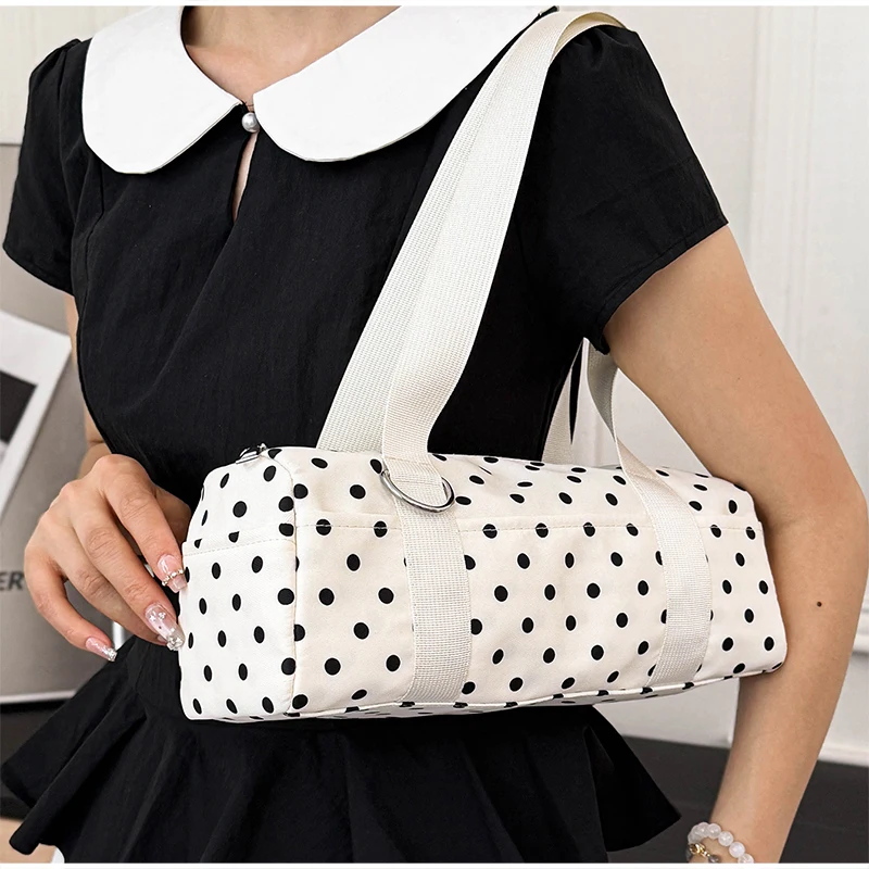 Gepunktete Schultertasche in langem Zylinderformat, Damen-Handtasche mit Tragegriff, zylindrische, leichte, schicke Tragetasche für den Arbeitsweg – Detail 13