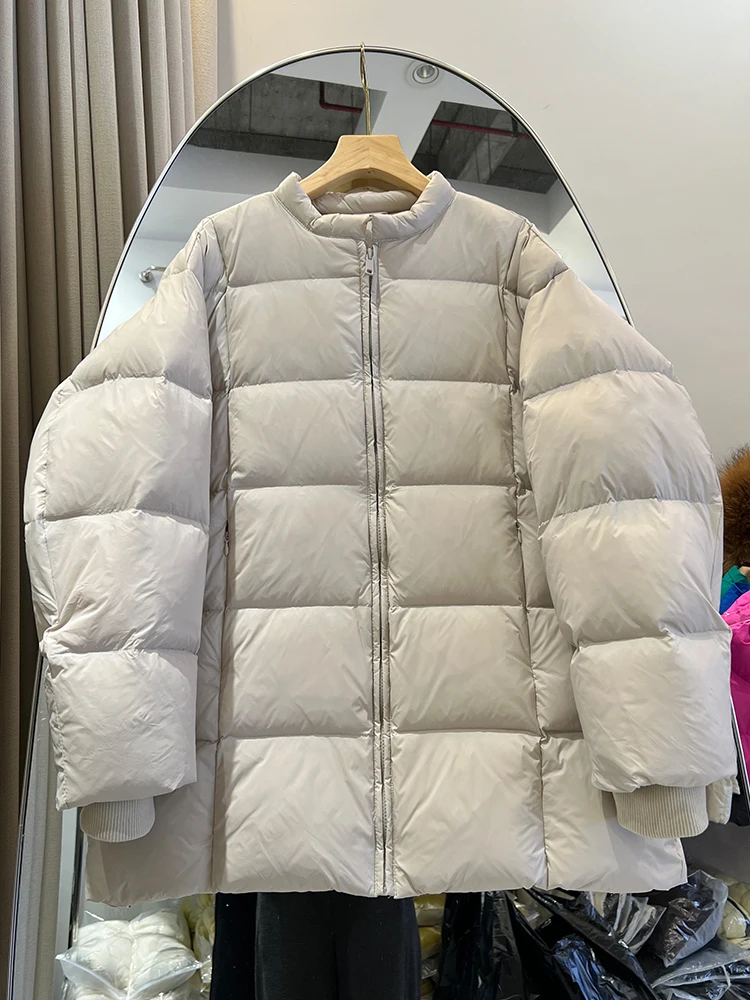 سترة نسائية ذات تصميم كوري متوسطة إلى طويلة ورقبة دائرية فضفاضة وسميكة وبسيطة #1