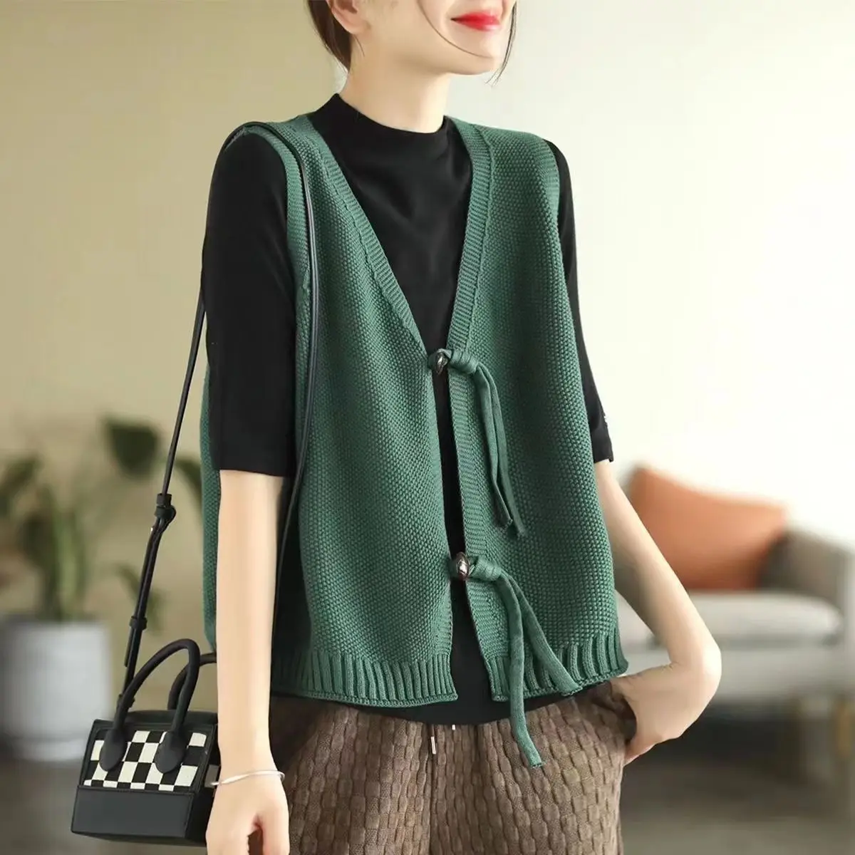 Artistic Retro Twisted Rope Buckle V-neck Vest Women's Solid Color Loose and Versatile Knitted Sweater