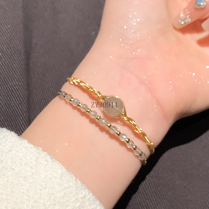 Nueva pulsera china de piedra lunar, pulsera de anillo liso para mujer, pulsera de cristal de fresa Premium, mano elástica de estilo nacional