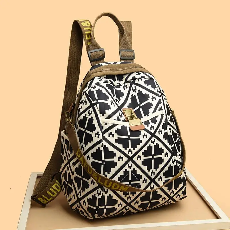 Large Capacity Lucky Four Leaf Clover Backpack for Women Casual Oxford Cloth Travel Bag Fashionable 2026 New Style Ladies Bag