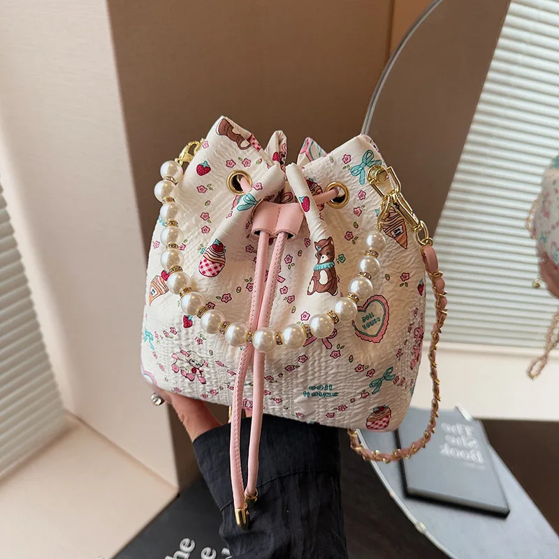 

Trendy Women's Bag - Drawstring with Pearl Elements, Elegant & Understated, Ideal for Commuting, Hand - carry & Cross - shoulder
