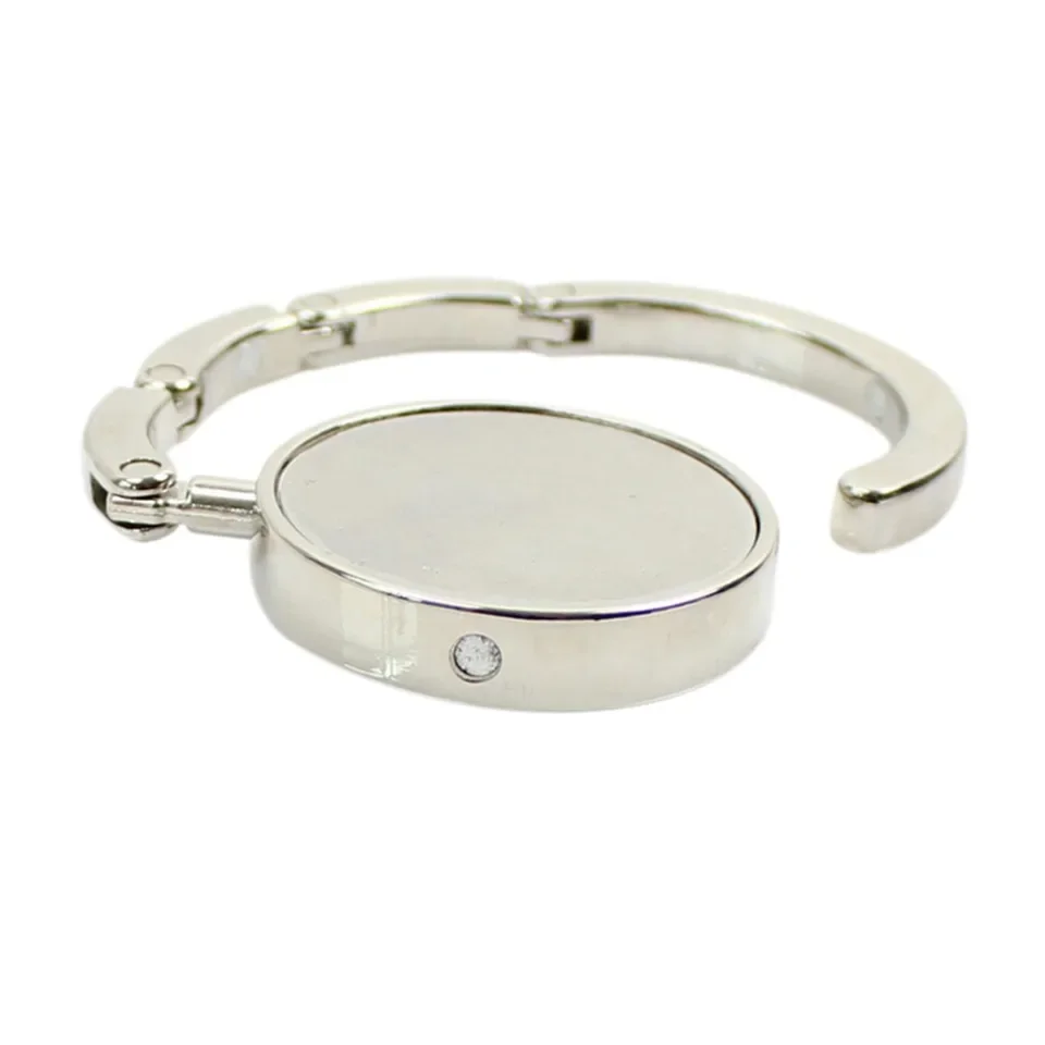1pc compact foldable crystal-accented alloy handbag hanger for tabletop use lightweight durable carbon steel construction ergono